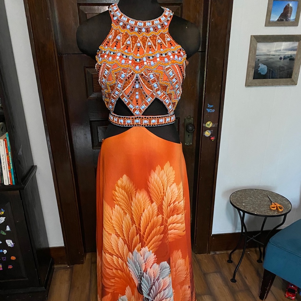 Mon Cheri  style 116723. Size 6. NWT